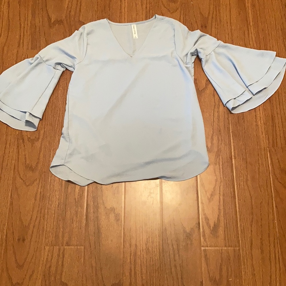 Light blue flare sleeve top